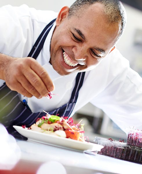 A chef preparing a meal